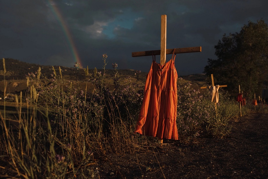 A line of children’s clothing along the highway signifies the children who died at the Kamloops Indian Residential School in Kamloops, British Columbia.Credit...