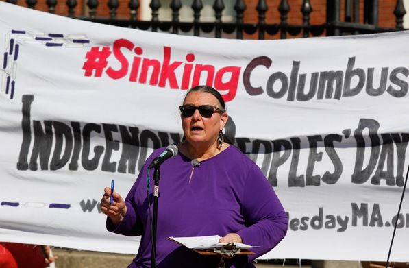 BOSTON, MA - OCTOBER 10-SATURDAY: Mahtowin Munro, co-leader of United American Indians of New England, addresses protesters while participating in a "Sink Columbus" rally and march by groups looking to change the name of Columbus Day to Indigenous Peoples Day October 10, 2020, in Boston, Massachusetts. (Photo by Paul Connors/Media News Group/Boston Herald)