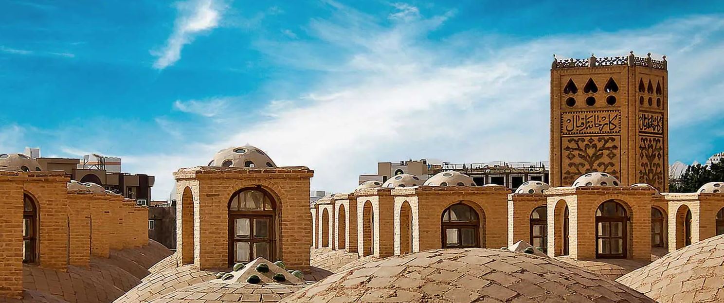 The City of Yazd is located in the middle of the Iranian plateau, 270 km southeast of Isfahan, close to the Spice and Silk Roads. It bears living testimony to the use of limited resources for survival in the desert. Water is supplied to the city through a qanat system developed to draw underground water. The earthen architecture of Yazd has escaped the modernization that destroyed many traditional earthen towns, retaining its traditional districts, the qanat system, traditional houses, bazars, hammams, mosques, synagogues, Zoroastrian temples and the historic garden of Dolat-abad.