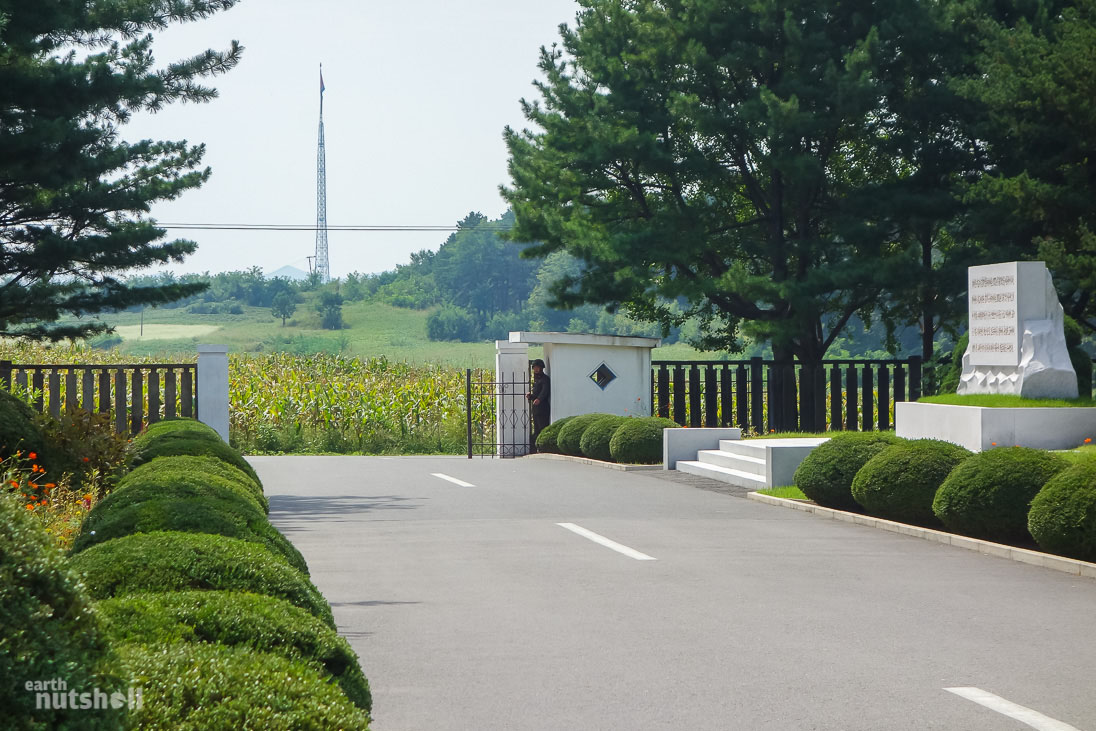 This is the military checkpoint at Panmunjom within the DMZ. In the distance, you can spot the infamous 160m flagpole erected inside the village of Kijong-dong. Kijong-dong is referred to by South Korea as ‘propaganda village’, built to lure South Korean soldiers to defect across to the North during the 1950’s. The village can be seen with binoculars from South Korea and despite North Korea’s claims of Kijong-dong being an inhabited collective farm, evidence suggests the buildings are empty concrete shells with lighting on timers to give the impression of activity.