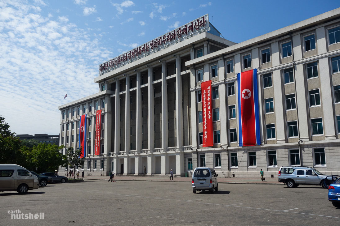  “The Great Comrade Kim Il-Sung and Comrade Kim Jong-Il will be with us eternally.” A major ministerial building in central Pyongyang.