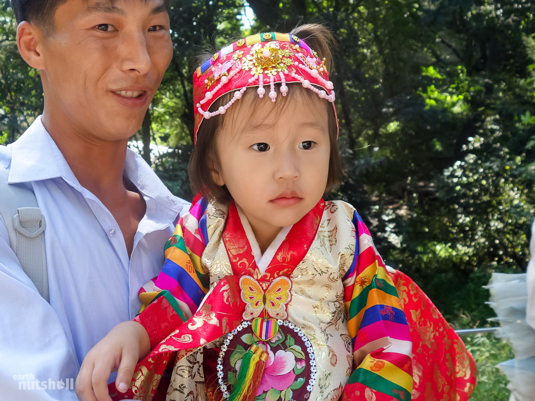  A young girl dressed for the National Day festivities in Moranbong Park.