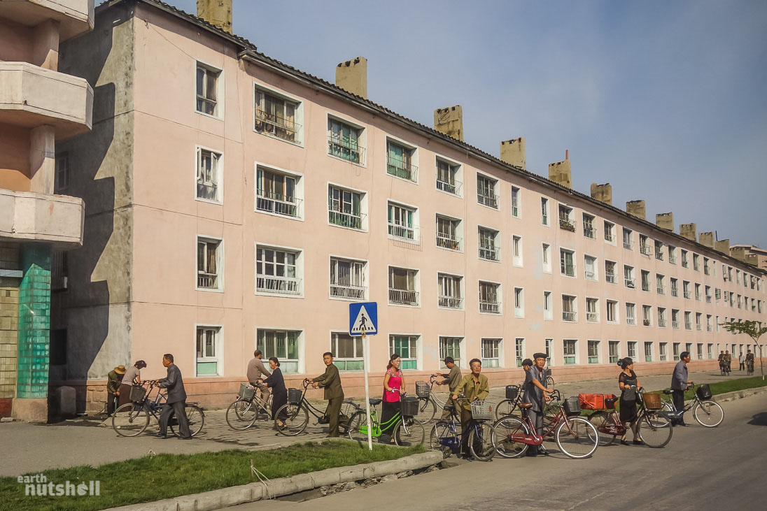 Bicycles are the primary means of transport in North Korea. Cars represent an astronomical expense for the average North Korean and it’s cost prohibitive to purchase one. Gasoline shortages make them further expensive to run. Photo taken in Wonsan.