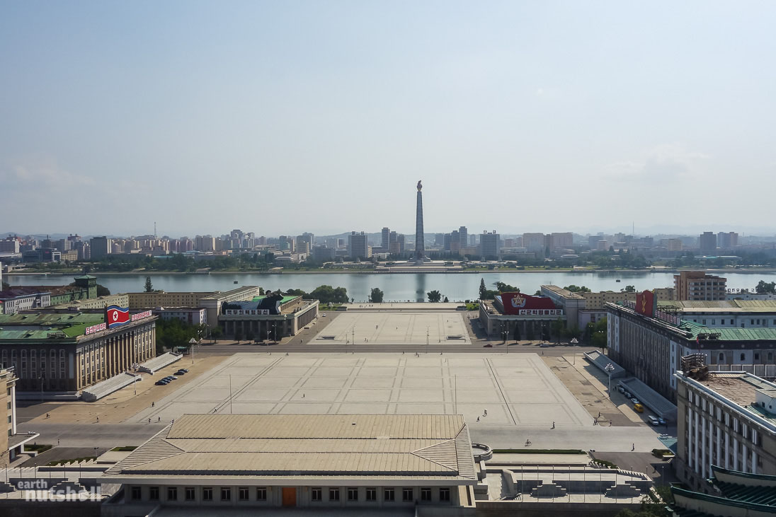 Kim Il-Sung Square. If you’ve ever seen goose-stepping North Korean soldiers on television, then you’ve seen this location. Kim Il-Sung Square is where most military parades, mass dances and rallies take place. In the distance is the Tower of the Juche Idea (Juche Tower).