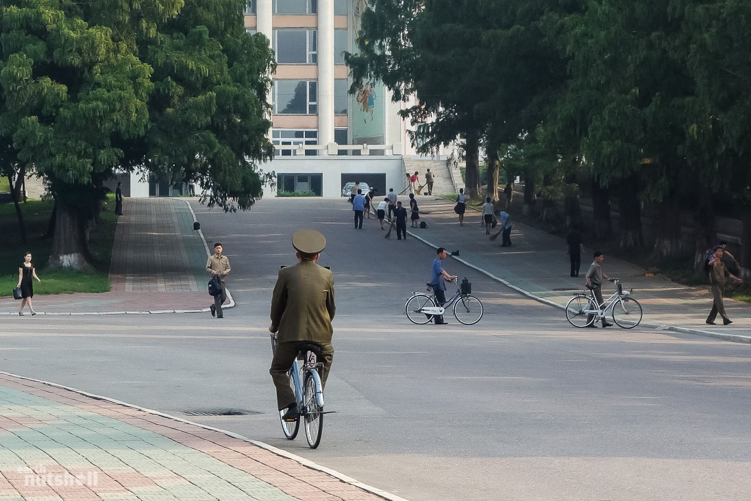 Private (pseudo-private) ownership of cars has exponentially increased in Pyongyang over recent years due to an emerging wealthy middle-class. Still, to own a car in North Korea’s capital remains exceptional and expensive. Even Korean People’s Army officers can’t go past the convenience and cost efficiency of a bicycle.