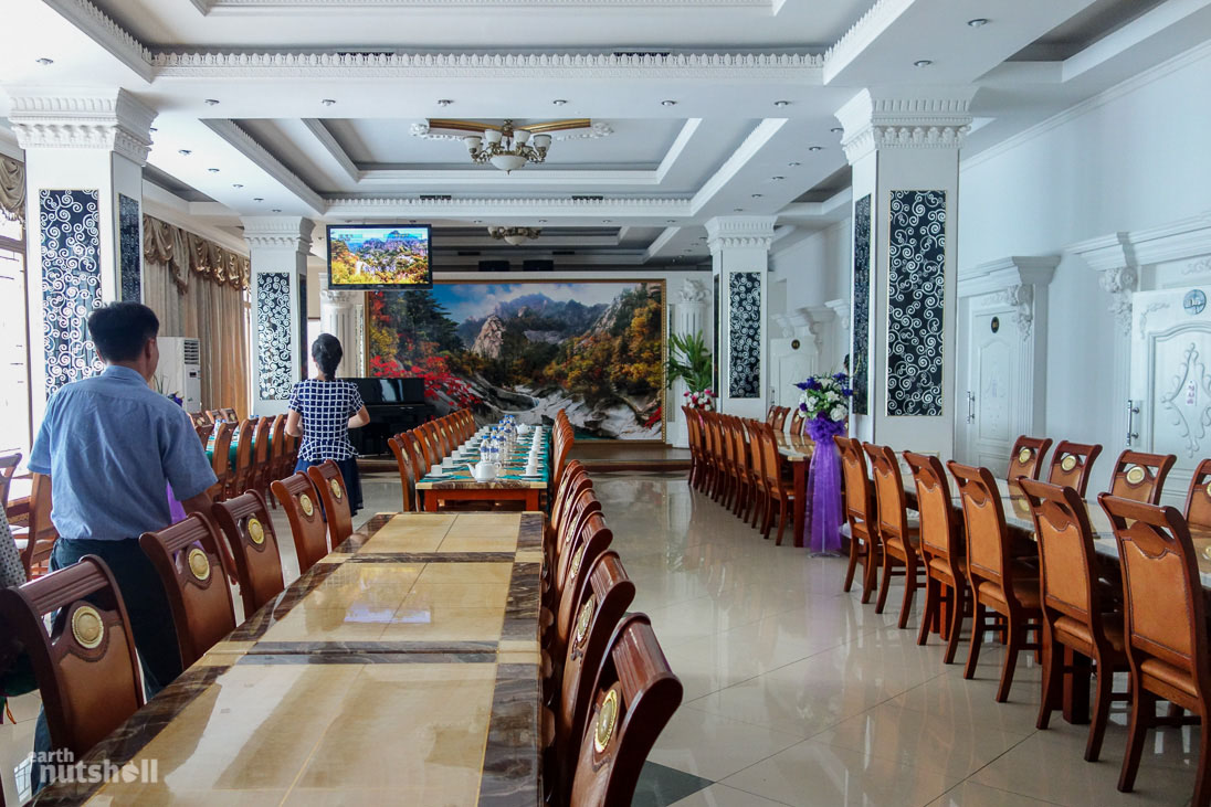 This is the typical restaurant setting inside Pyongyang. As a general rule, the restaurants you dine at as a tourist will be empty with no other expected guests. Karaoke will always be available and murals of holy places such as Mt. Paektu (Paektusan) decorate the interiors.