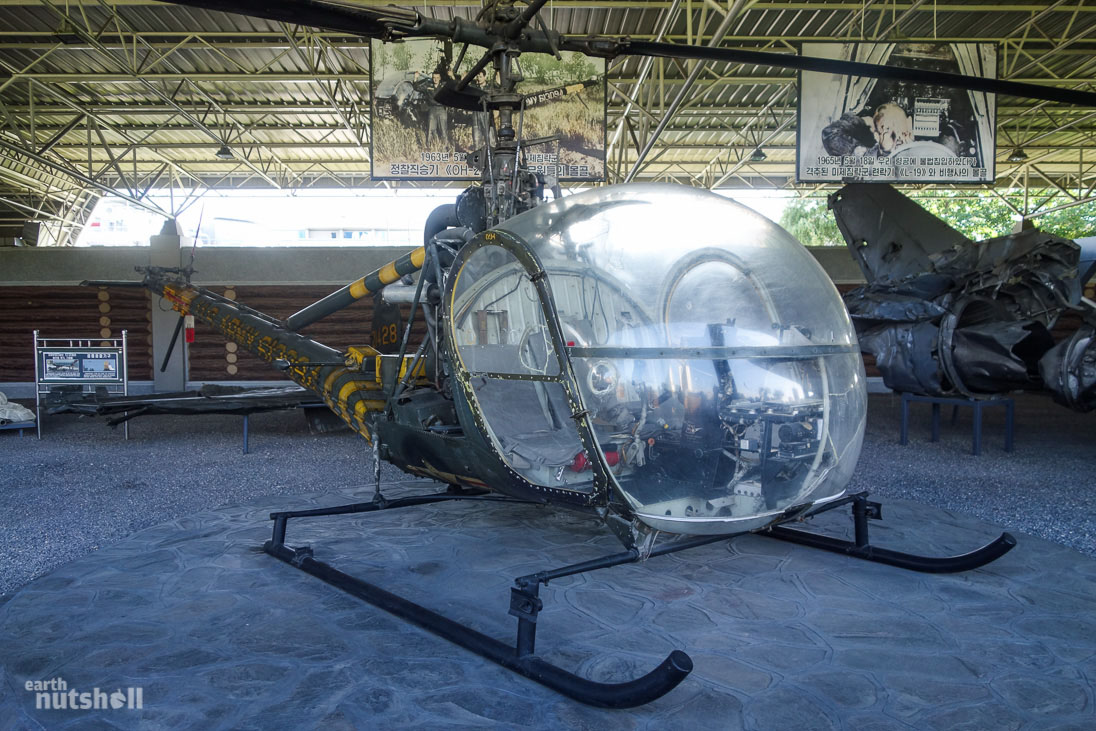 A captured US Army helicopter showcased at the Victorious Fatherland Liberation War Museum in Pyongyang. Note the photos above, one of the American ‘imperialists’ surrendering and the other a gruesome uncensored photo of an American pilot shot in the head. Schoolchildren visit here in groups to learn about the Korean War.