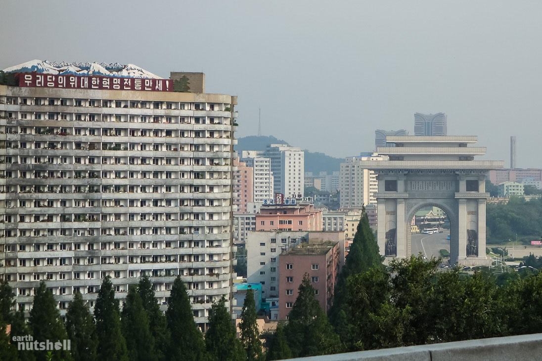 “Long live the great revolutionary traditions of our party, hooray!”, “National Reunification, frequent self-defence.” To the right sits the ‘Arch of Triumph’, which was built with exactly 25,500 blocks, one for each day of President Kim Il-Sung’s life for his 70th birthday.