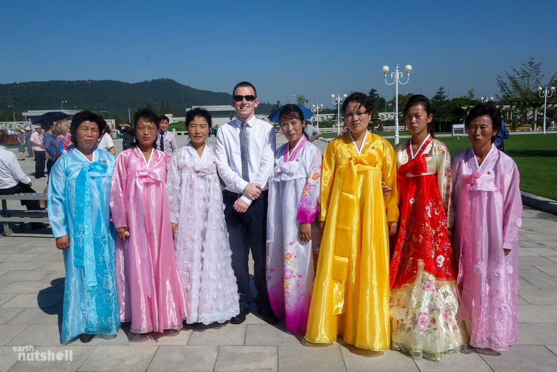  Formally dressed ladies arriving to show their respects to the Great Leaders lying in state at the Kumsusan Palace of the Sun (The Mausoleum).