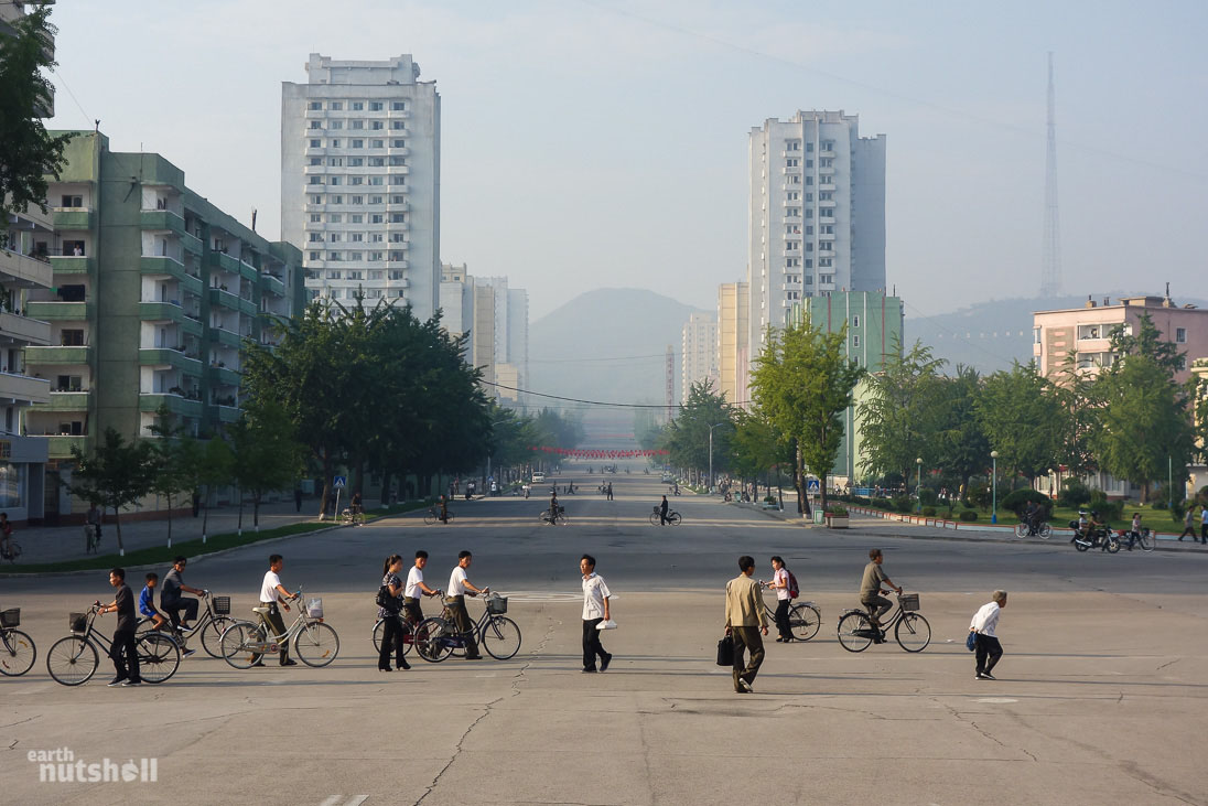  Early morning in Kaesong city. As I took this photo, propaganda speeches were loudly blasting into the streets from loudspeakers placed on buildings. There is no vehicular traffic, so the city is eerily quiet except for that melodramatic voice piercing the streets. It felt like a textbook example of communist society.