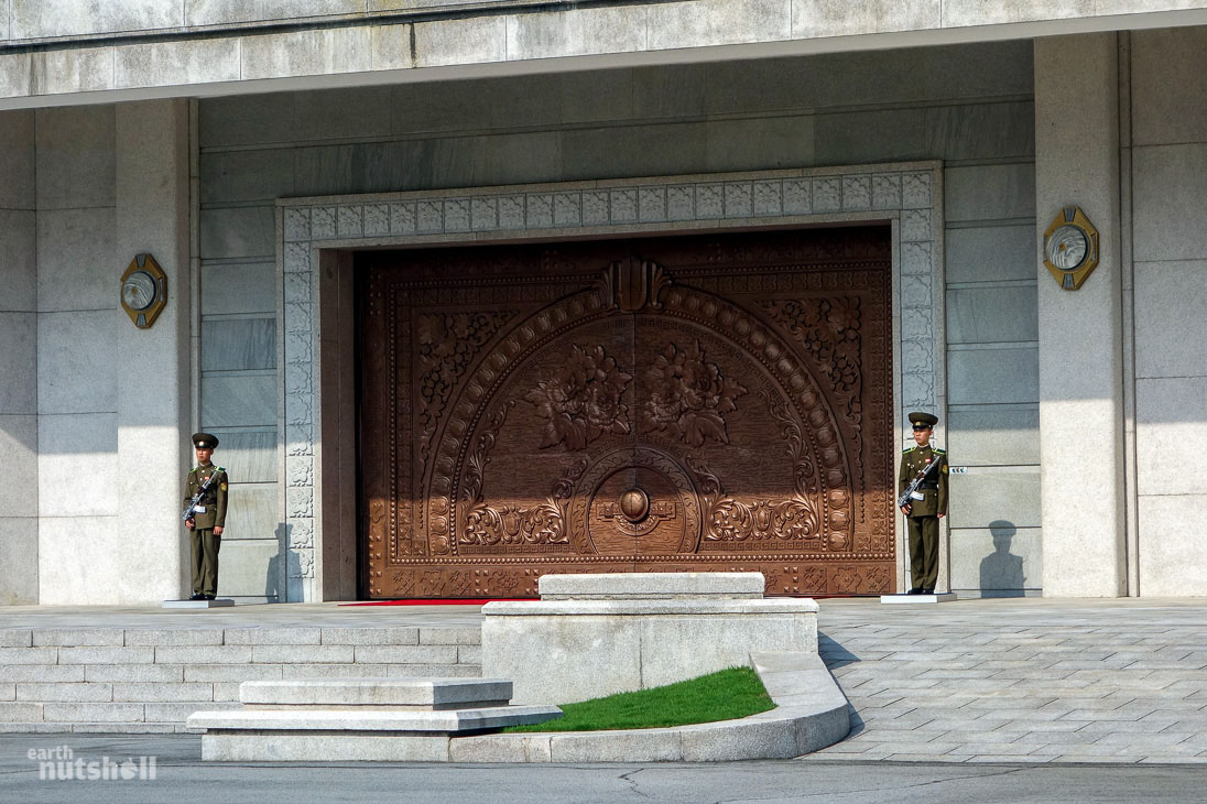  This is the entrance to the International Friendship Exhibition. The doors part ways as you approach. Behind is a lavish tunnel system carved into the mountains with numbered rooms which proudly display hundreds of thousands of gifts given to each Great Leader by foreign governments and entities. The basketball signed by Michael Jordan and given to General Kim Jong-Il by Madeleine Albright is showcased here, as are extravagant gifts like golden AK47’s, bear skin rugs and even a taxidermied alligator cocktail server. Almost every nation on earth is represented and this site is used as evidence of the Great Leader’s international diplomacy prowess, influence and endearment.