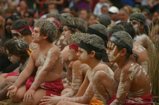 Young boys waiting for their turn at Woggan-ma-gule ('meeting of the waters') in the Botanic Gardens, Sydney.
