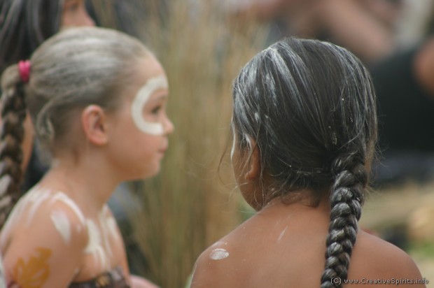 Two young girls await their turn during the dance.