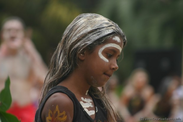 A girl concentrates on the right moves during the ceremony.