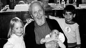Children of God cult leader David Berg pictured with an unidentified kids.