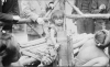 Girl from Philippines. she was displayed at the Coney Island Zoo. She was a zoo attraction among the monkeys and lizards. she was bound by ropes. visitors threw her peanuts. 1914 [720x439]: